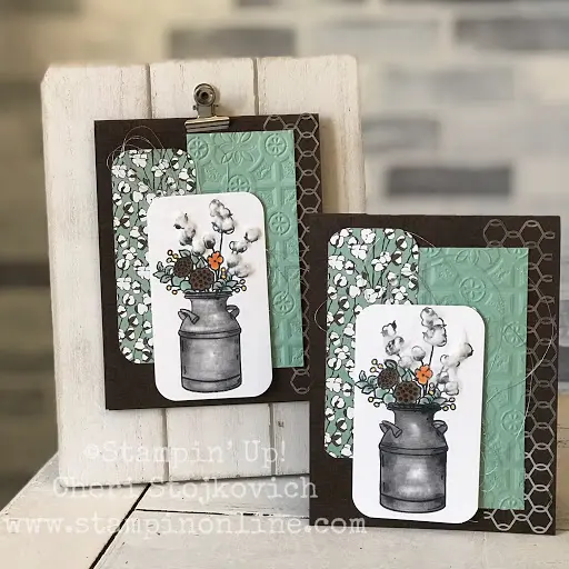 Two handmade floral milk-can greeting cards